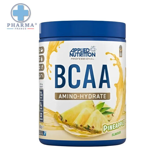Conteneur cylindrique bleu de applied nutrition bcaa amino hydrate saveur ananas avec étiquette blanche et motifs ananas jaunes et verts
