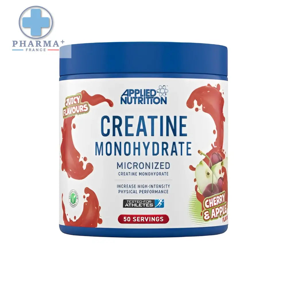 Contenant cylindrique bleu d’applied nutrition créatine monohydrate saveur cerise pomme avec étiquette blanche et éclaboussures rouges